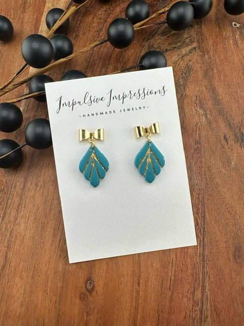 Blue Green Dangle with Gold Bow