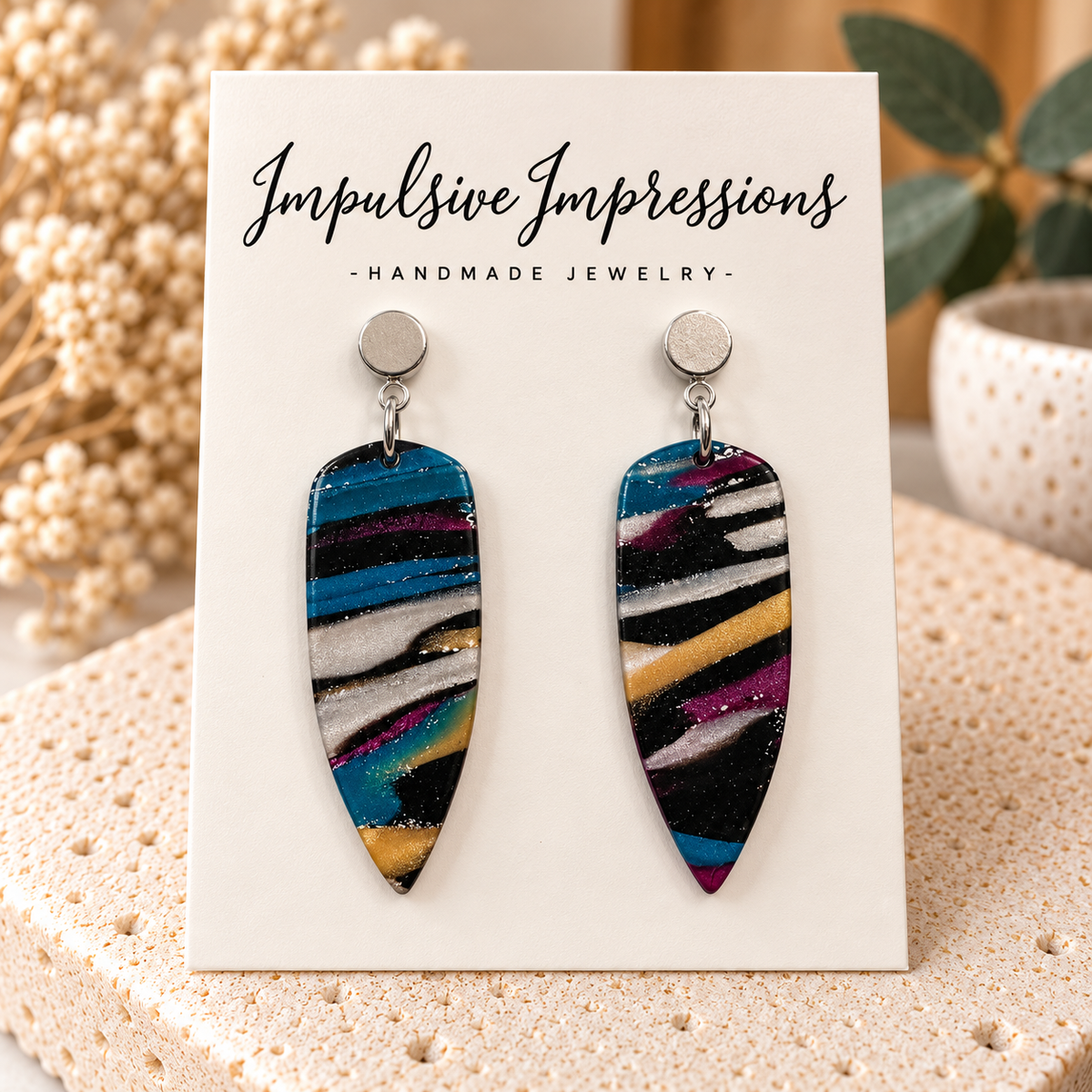 Striped teal black gold and silver polymer clay tapered earrings