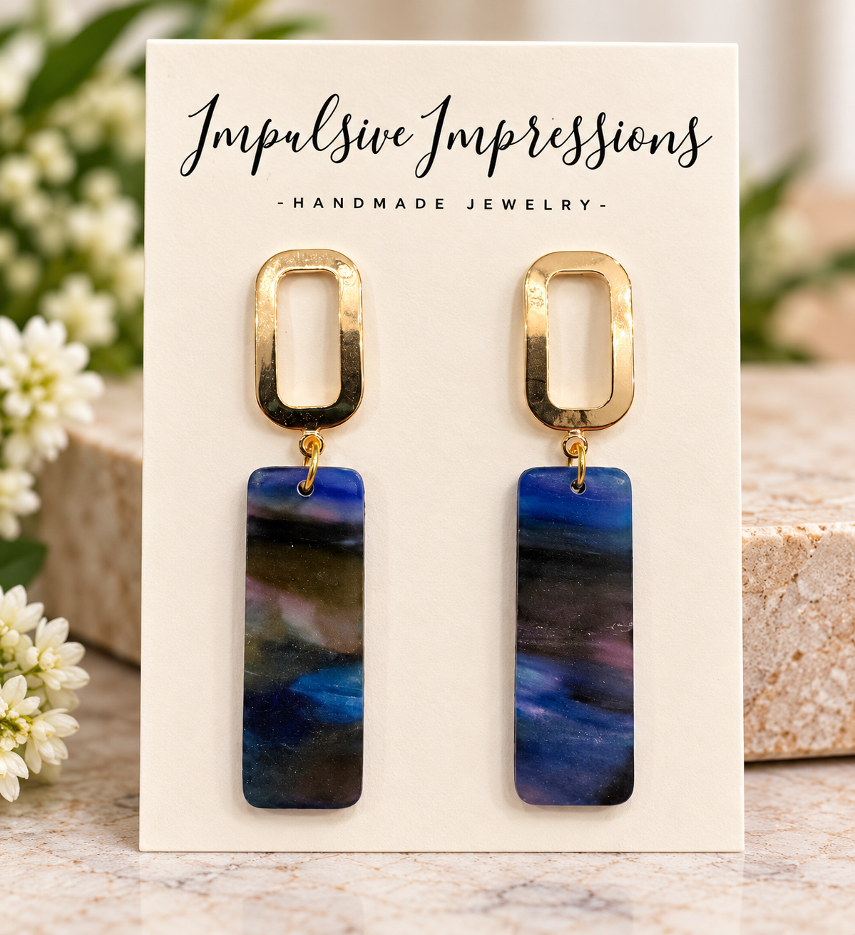 Midnight blue marbled polymer clay earrings with gold-tone studs