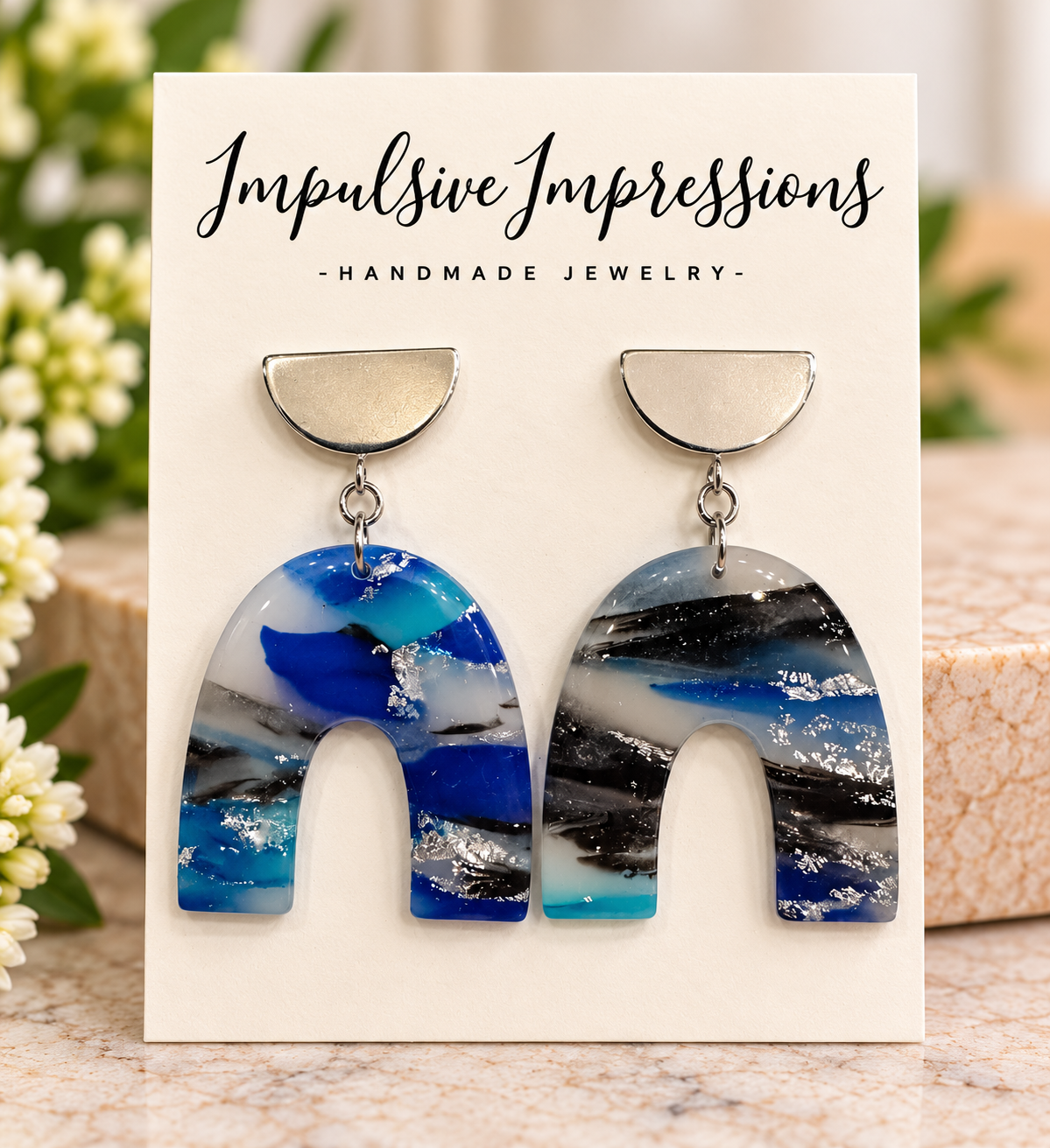 Blue and silver marbled polymer clay arch earrings