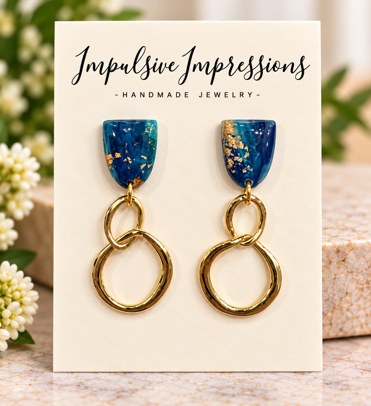 Blue polymer clay earrings with linked gold-tone hoops