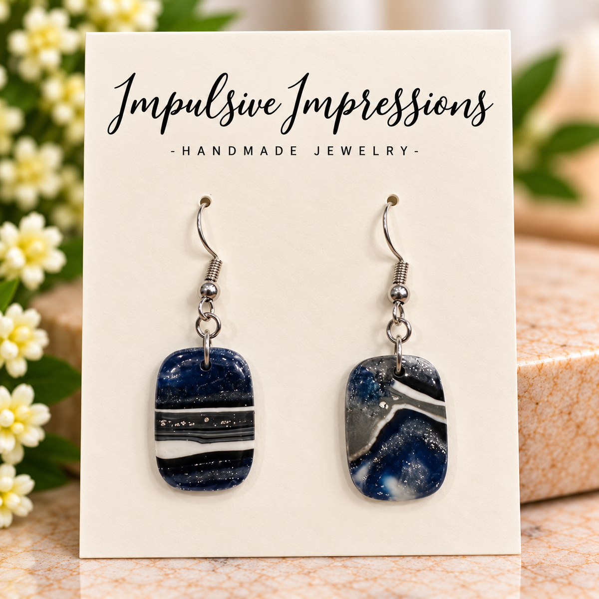 Navy and white marbled polymer clay drop earrings