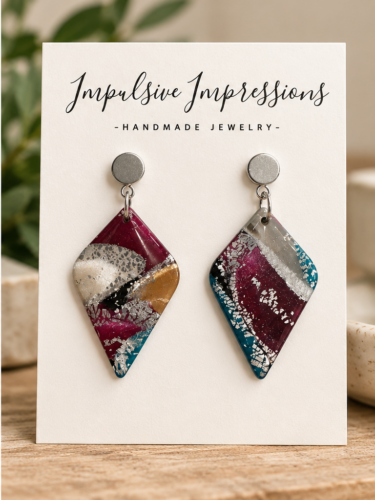 SKU 54 burgundy and teal diamond polymer clay earrings styled product photo