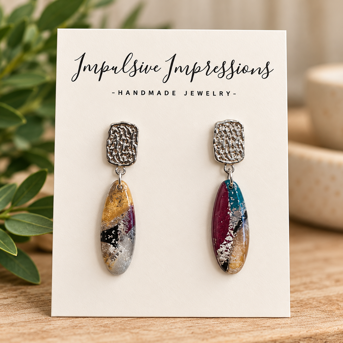 SKU 55 marbled oval polymer clay earrings with textured silver tone studs