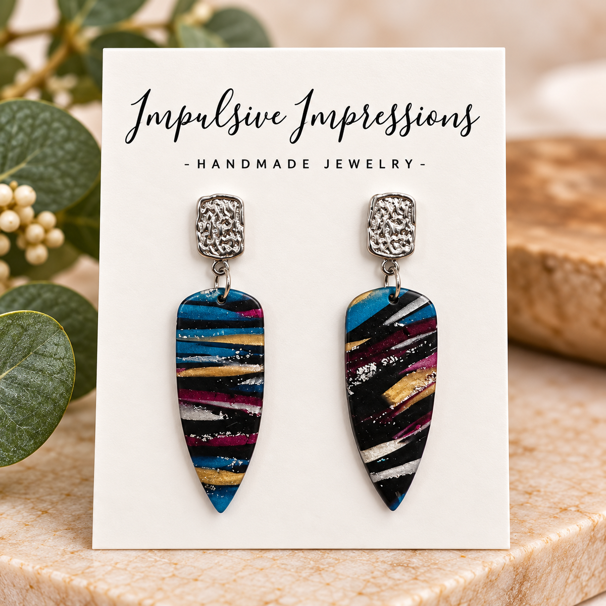 Textured silver and teal gold striped polymer clay earrings