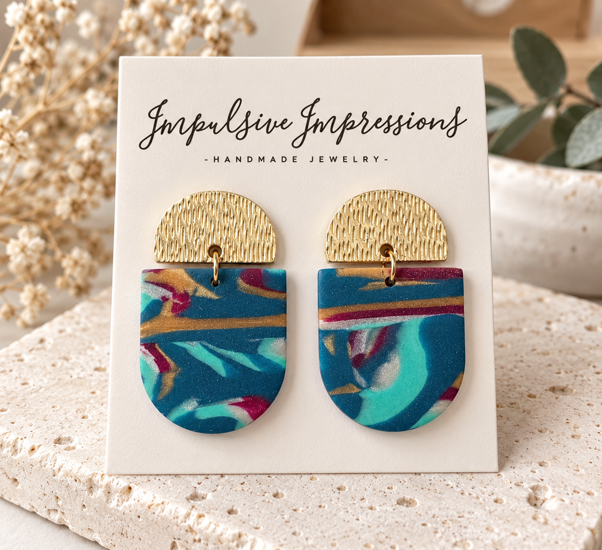 Marbled teal polymer clay dangle earrings with gold-tone tops