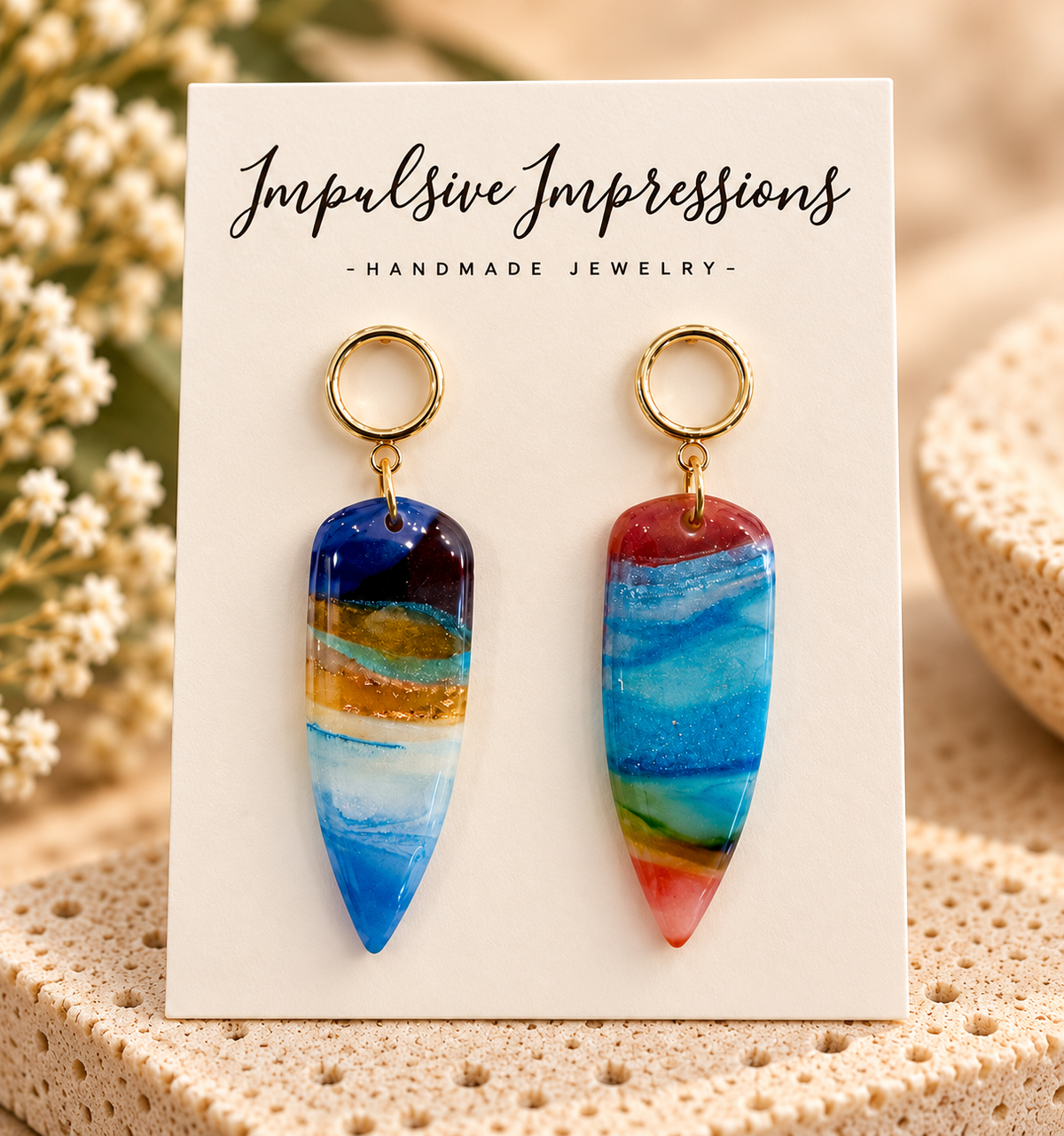 Multicolored pointed polymer clay drop earrings with gold-tone circle studs
