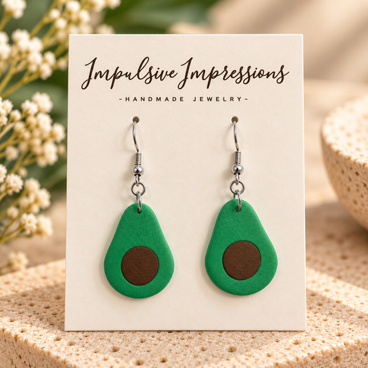 Handmade green avocado polymer clay earrings with silver-tone fishhook wires
