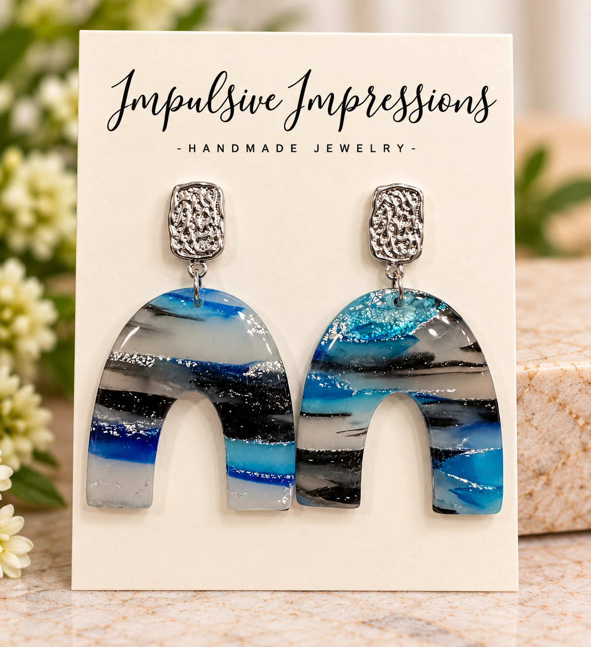Blue marbled arch polymer clay earrings with silver-tone studs