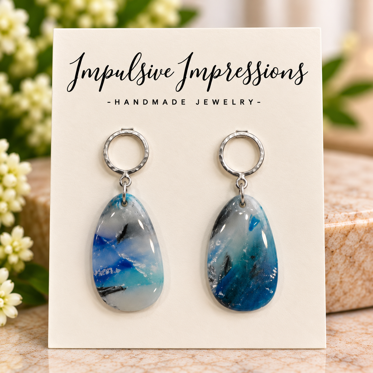Glossy blue and gray marbled polymer clay teardrop earrings