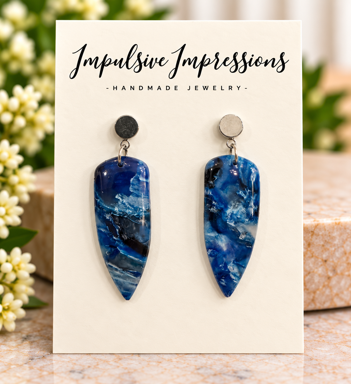 Glossy deep blue marbled polymer clay pointed drop earrings