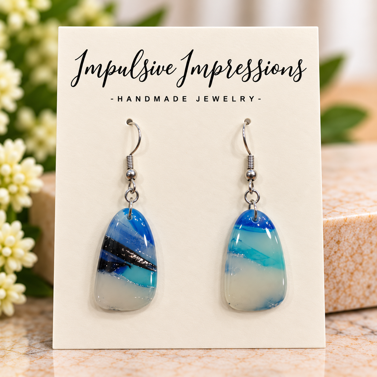 Glossy blue aqua and cream polymer clay earrings