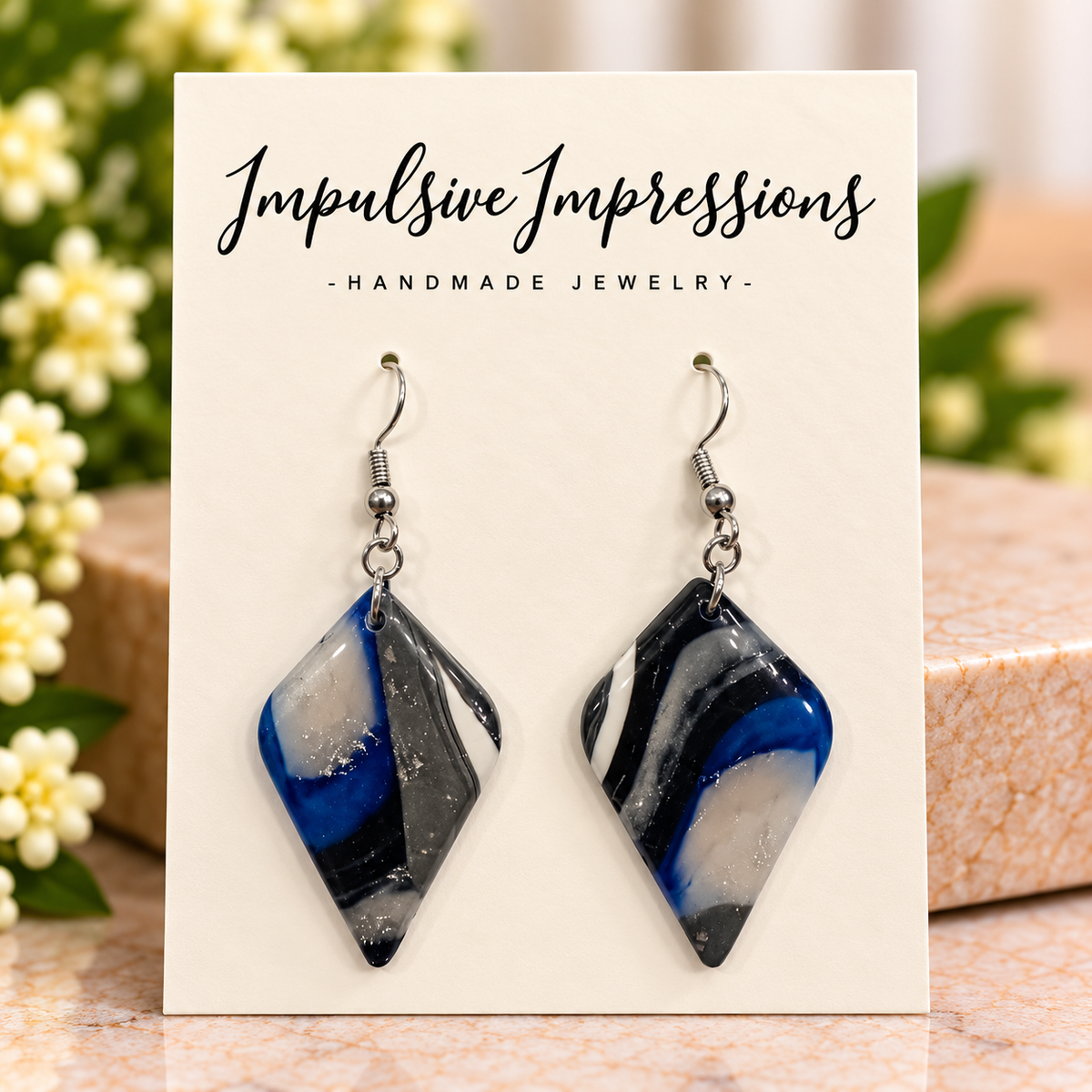 Glossy midnight blue and charcoal marbled diamond polymer clay earrings