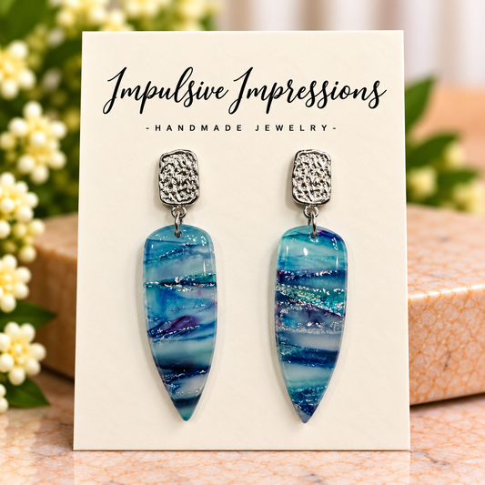 Ocean blue glossy tapered polymer clay dangle earrings